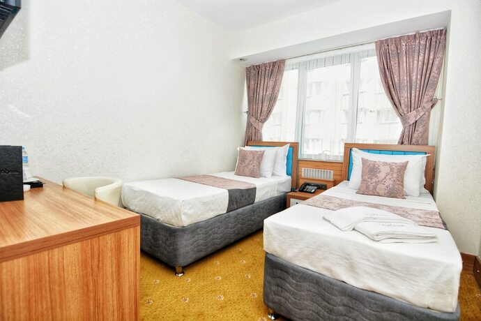 Imagen de la habitación del Grand Sah Otel. Foto 18