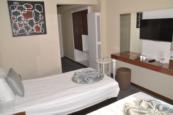 Imagen de la habitación del Grand Sera Hotel. Foto 12