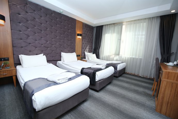 Imagen de la habitación del Grand Silay Hotel. Foto 6