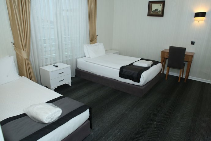 Imagen de la habitación del Grand Silay Hotel. Foto 10