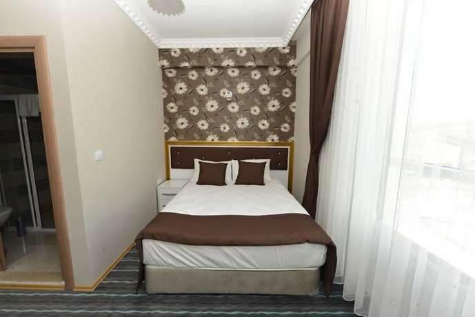 Imagen de la habitación del Grand Surmely Business Hotel. Foto 5