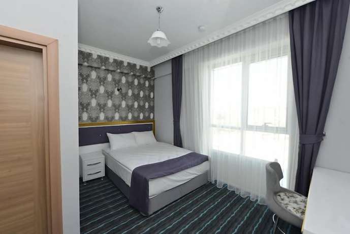 Imagen de la habitación del Grand Surmely Business Hotel. Foto 6