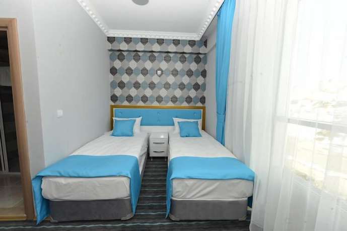 Imagen de la habitación del Grand Surmely Business Hotel. Foto 10