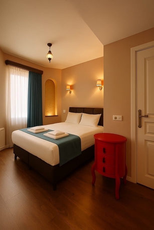 Imagen de la habitación del Grand U&ccedil;hisar Hotel. Foto 2