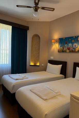 Imagen de la habitación del Grand U&ccedil;hisar Hotel. Foto 7