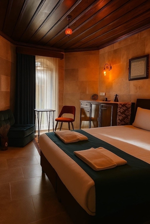 Imagen de la habitación del Grand U&ccedil;hisar Hotel. Foto 12