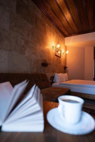 Imagen de la habitación del Grand U&ccedil;hisar Hotel. Foto 13