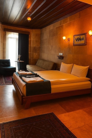 Imagen de la habitación del Grand U&ccedil;hisar Hotel. Foto 14