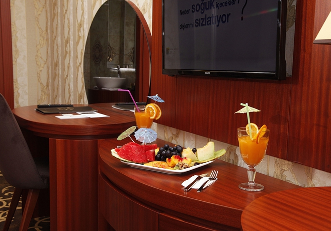 Imagen de la habitación del Grand Vuslat Hotel. Foto 7