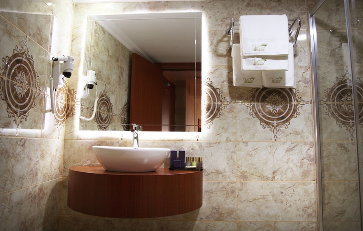 Imagen de la habitación del Grand Vuslat Hotel. Foto 10