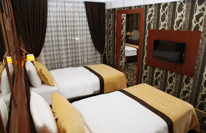 Imagen de la habitación del Grand Vuslat Hotel. Foto 14