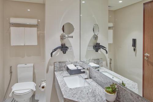 Imagen de la habitación del Grand Westside Hotel. Foto 14