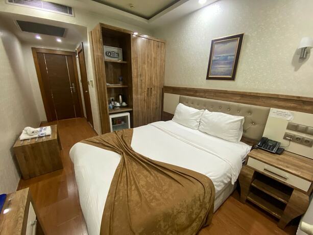 Imagen de la habitación del Grand Zara Otel. Foto 15