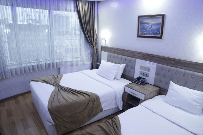 Imagen de la habitación del Grand Zara Otel. Foto 17