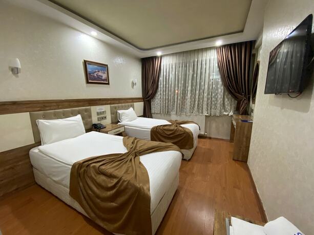 Imagen de la habitación del Grand Zara Otel. Foto 18
