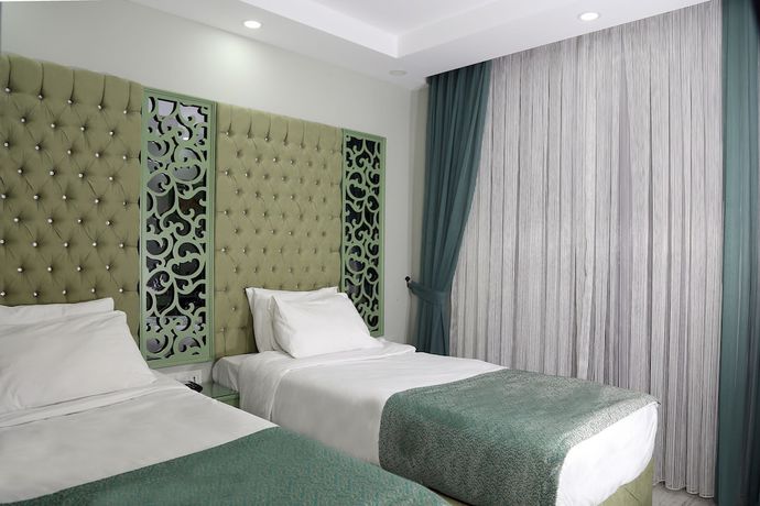 Imagen de la habitación del Green Garden Hotel. Foto 15