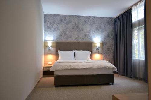 Imagen de la habitación del Green Hill Hotel. Foto 11
