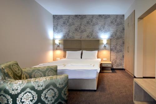 Imagen de la habitación del Green Hill Hotel. Foto 13
