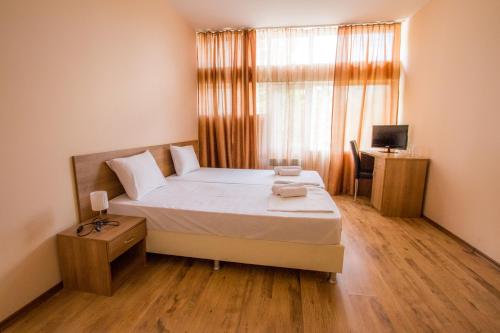Imagen de la habitación del Green Hill Hotel. Foto 14