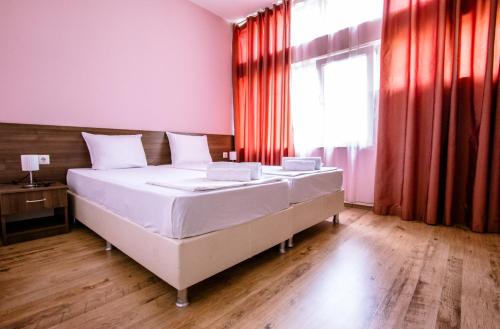 Imagen de la habitación del Green Hill Hotel. Foto 16