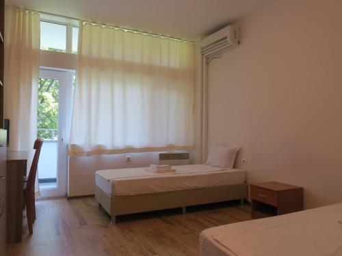 Imagen de la habitación del Green Hill Hotel. Foto 18