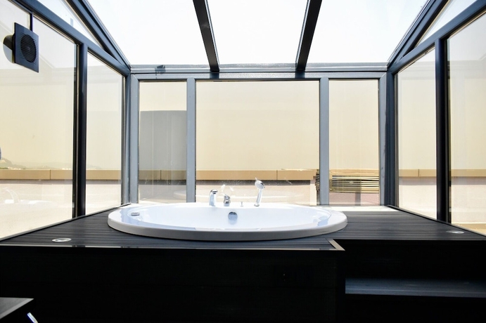 Imagen de la habitación del Green Hills Suites, Koru. Foto 5