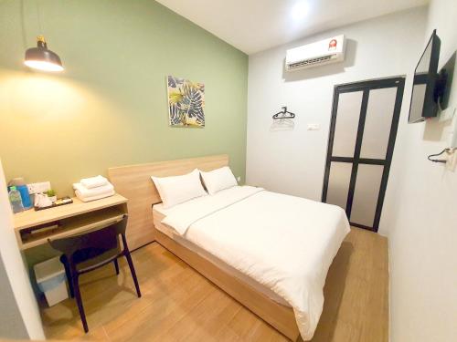 Imagen de la habitación del Green Home Hotel. Foto 5