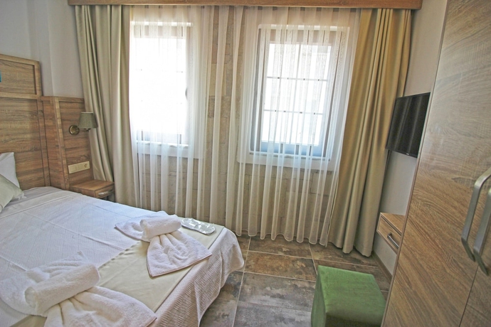 Imagen de la habitación del Green House Bozcaada. Foto 3