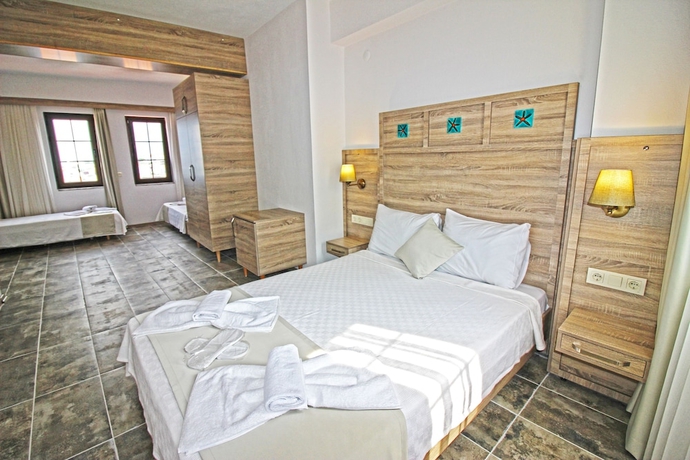 Imagen de la habitación del Green House Bozcaada. Foto 14