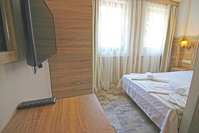 Imagen de la habitación del Green House Bozcaada. Foto 15
