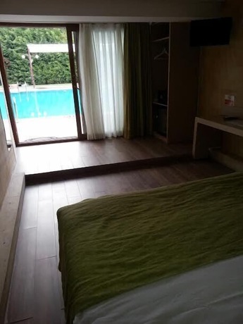 Imagen de la habitación del Green House Garden Park. Foto 18