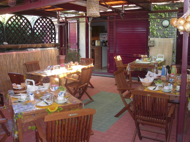 Imagen del bar/restaurante del Green Paradise Affittacamere. Foto 2