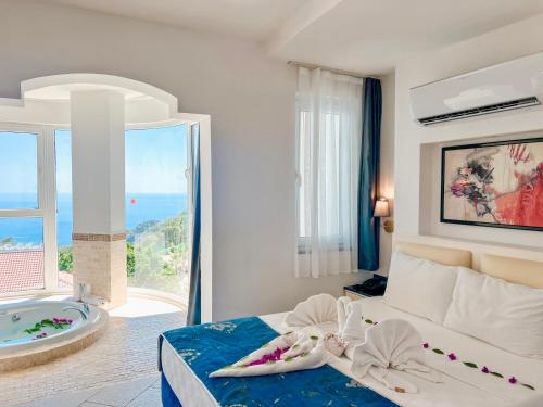 Imagen de la habitación del Green Tropical Suites Oludeniz. Foto 11