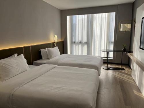 Imagen de la habitación del GreenTree Eastern Hotel Yiwu International Trade City. Foto 16