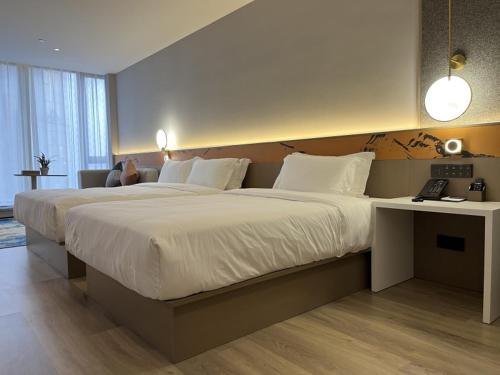 Imagen de la habitación del GreenTree Eastern Hotel Yiwu International Trade City. Foto 19