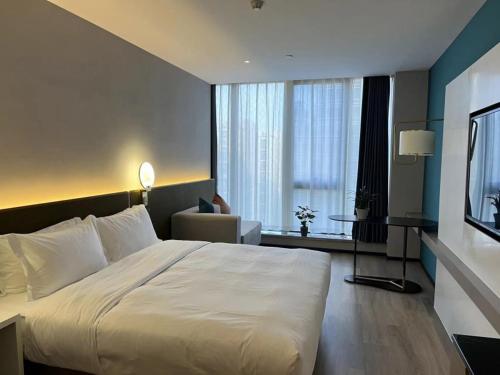 Imagen de la habitación del GreenTree Eastern Hotel Yiwu International Trade City. Foto 20