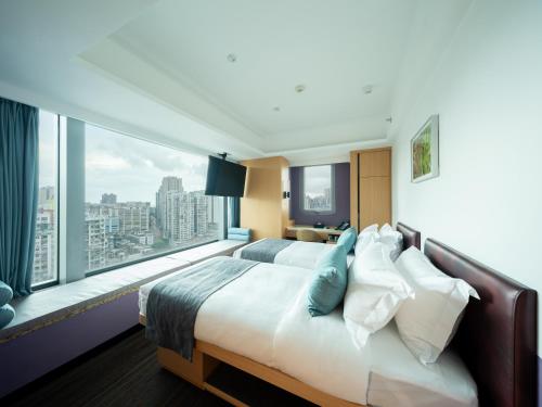 Imagen de la habitación del Greenery Inn, Macau. Foto 13