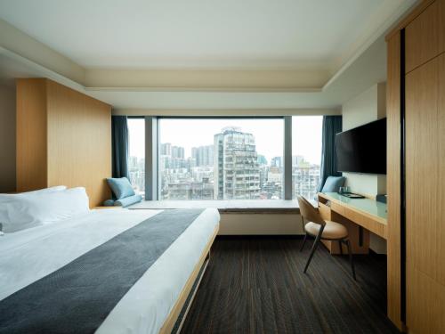 Imagen de la habitación del Greenery Inn, Macau. Foto 18