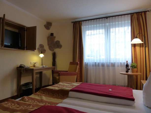 Imagen de la habitación del Grimmelshausen Hotel. Foto 20
