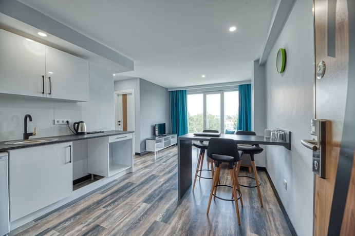 Imagen de la habitación del Grisverde Suites. Foto 2