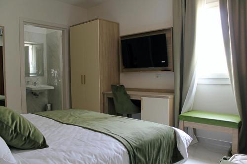 Imagen de la habitación del Grotta Saracena Resort. Foto 16