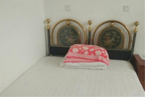 Imagen de la habitación del Gu Se Gu Xiang Home Stay. Foto 8