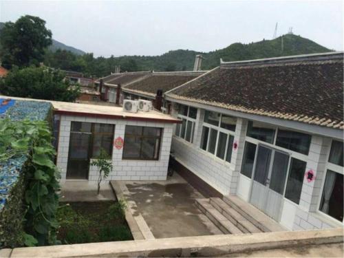 Imagen general del Gu Se Gu Xiang Home Stay. Foto 3