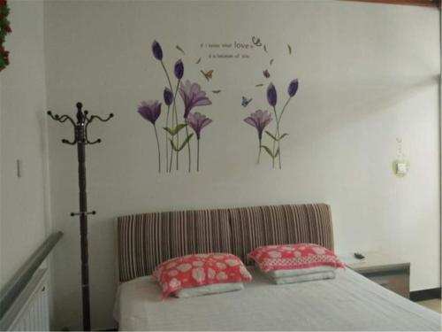 Imagen de la habitación del Gu Se Gu Xiang Home Stay. Foto 9