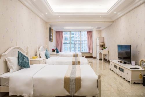 Imagen de la habitación del Guangzhou Chunxi Wanyi International Apartment. Foto 9