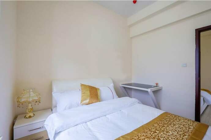 Imagen de la habitación del Guangzhou Mimi Apartment. Foto 22