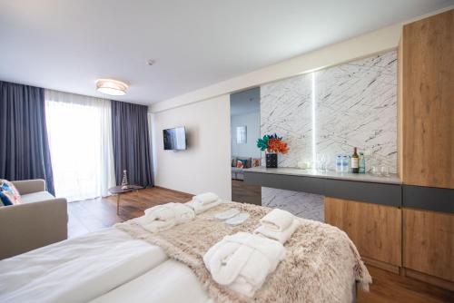 Imagen de la habitación del Gudauri Atrium ApartHotel. Foto 11