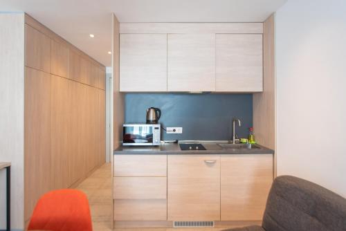 Imagen de la habitación del Gudauri Atrium ApartHotel. Foto 16