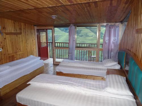 Imagen de la habitación del Guilin Longji Xin Jia Yuan Hotel. Foto 5