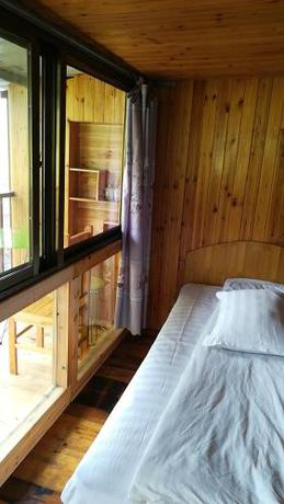 Imagen de la habitación del Guilin Longji Xin Jia Yuan Hotel. Foto 6